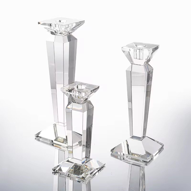Elegant clear crystal candle holders, polished decorative holders for tabletop and home decor, designed to hold standard candles